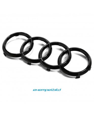 Svart Audi quattro-emblem...